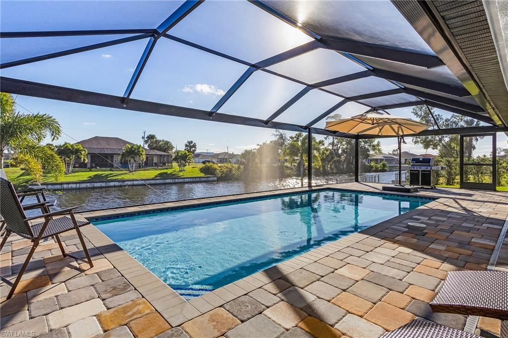 TURNKEY WATERFRONT POOL HOME | FULLY FURNISHED | VACATION-RENTAL READY
A rare opportunity to own a fully furnished, income-producing waterfront pool home that is ready to enjoy from day one and fully equipped to continue operating as a short-term vacation rental. This is a proven, top-performing rental with a 4.97-star guest rating across 100+ reviews, Superhost and Guest Favorite status, and a ranking in the top 5% of homes.

Located on a wide (~70 ft) freshwater canal in desirable SW Cape Coral, this beautifully maintained home delivers the Florida lifestyle buyers are looking for. The lot has a seawall and a wood dock—cast a line or launch a kayak right from your backyard, and enjoy open water, better breezes, and peaceful views with no one directly behind you (just the wide canal between you and the homes across the water). Best of all, the home is in FLOOD ZONE X—NO FLOOD INSURANCE REQUIRED—and took on no flooding during Hurricane Ian.
The spacious lanai features a picture-window screen enclosure overlooking the 2022 heated saltwater pool and canal, creating unobstructed water views and the ideal spot to relax or entertain. Inside, the bright, open floor plan offers large windows and oversized sliding glass doors that seamlessly connect indoor and outdoor living.
Unlike many "furnished" homes, this property is offered as a true turnkey package. Everything needed to continue operating as a vacation rental is included—furniture, décor, kitchenware, cookware, utensils, dishes, small appliances, linens, towels, and operational essentials. Simply take ownership and continue enjoying or operating immediately.
Major updates include:

New roof (2023)
2021 AC system, compressor replaced (2025)
Heated saltwater pool (2022)
Picture-window screen enclosure (2022)
Pool pump replaced (2025)
Pool salt system replaced (2025)
Luxury vinyl flooring (2024)
Stainless steel appliances
Fresh interior and exterior paint
High-efficiency washer and dryer
New blinds and updated lighting
Security camera system (2022)

Minutes to dining, shopping, and everyday conveniences, and a short drive to Southwest Florida's Gulf beaches. Whether you're looking for a personal retreat, second home, investment property, or full-time residence, this home offers a rare combination of lifestyle, quality, and convenience.
Offered fully furnished and turnkey. Schedule your private showing today.

Owner has a an active FL real estate license.
