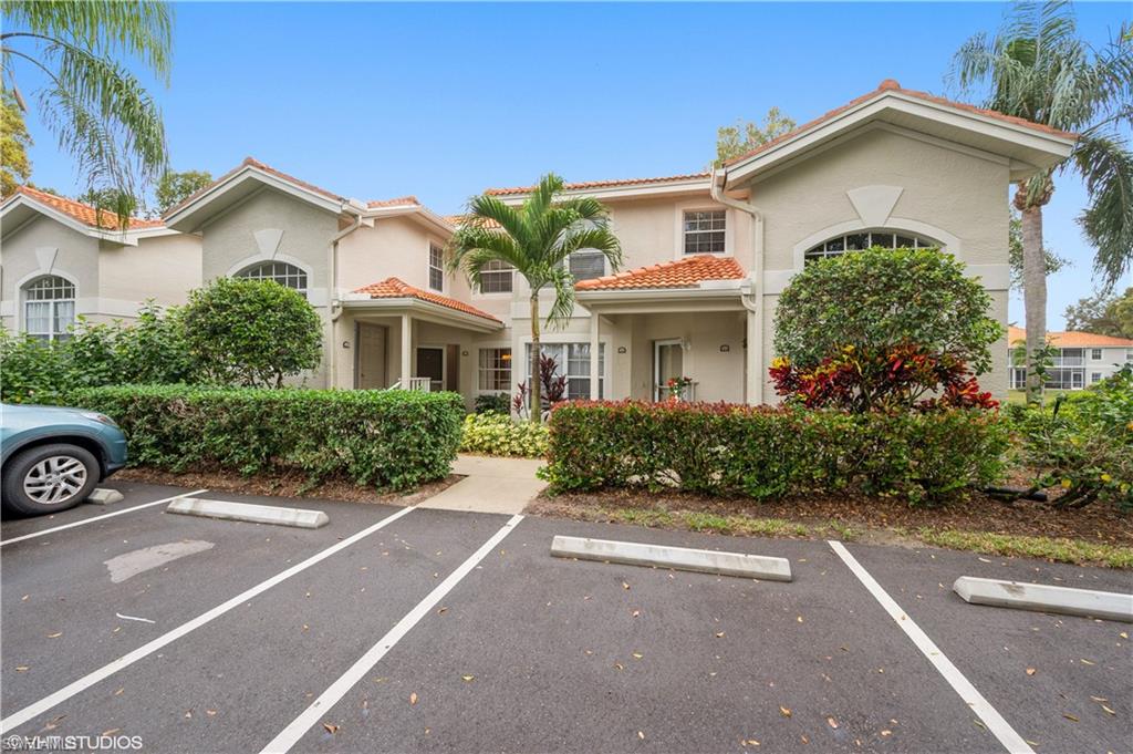 Location is a plus for this North Naples first floor condo in the friendly, gated Community of Piper's Grove. This 2 bedroom 2 bath unit overlooking the lake from the screened lanai has wood and tile floors, granite countertops, electric hurricane shutters over the sliders. newer stainless appliances and a jetted tub in the guest bathroom and an oversized shower in the Master bath. The tile roof is less than 3 years old and the Piper's Grove Condo Association is presently in the process of painting the exteriors with an updated, tasteful, color palette. Owners have an assigned covered carport with adjacent guest parking. This unit is in walking distance to one of the community pools and also to a shopping center with a Publix Supermarket.  Piper's Grove has an abundance of amenities such as 3 pools, clubhouse, tennis courts, pickleball, bocce ball plus much more. This fabulous location is close to the beach, and many of Naples great restaurants and shopping.