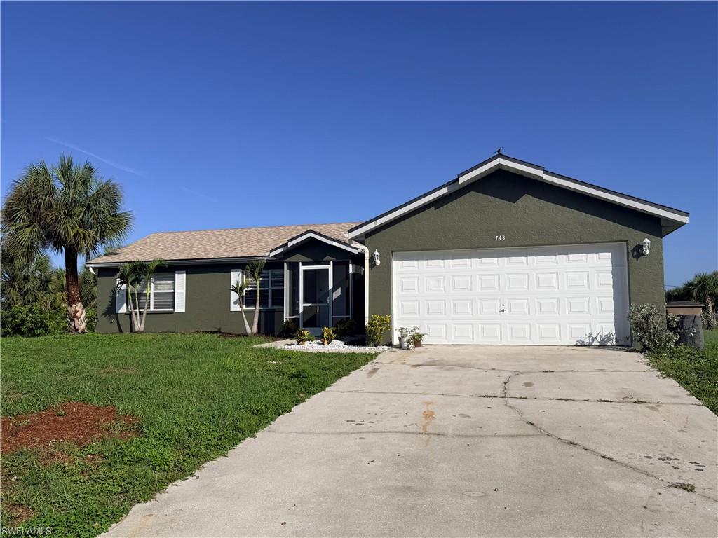 Located at the end of a quiet cul-de-sac, this well-maintained 3-bedroom, 2-bathroom, 2-car garage residence offers an ideal combination of updated finishes and a canal-front setting. The interior features tile flooring throughout the main living areas, with wood laminate flooring in all three bedrooms. Both the kitchen and bathrooms have undergone full renovations, showcasing dark wood cabinetry and granite countertops throughout.

The open floor plan includes a spacious living room and a separate dining nook adjacent to the kitchen, providing flexible space for daily living and entertaining. Sliding glass doors off the living area lead to a screened lanai overlooking the canal, offering a private outdoor retreat.

Additional highlights include a newly replaced roof (2024) and fresh interior and exterior paint throughout. This home presents an excellent opportunity for buyers seeking updated systems and finishes in a desirable cul-de-sac location.