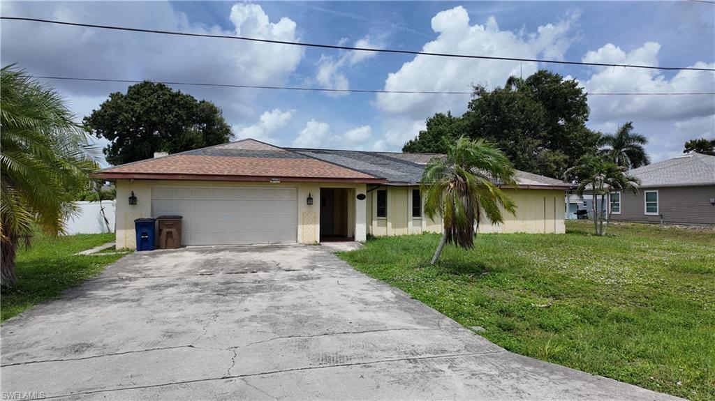 Perfectly situated just minutes from I-75, Southwest Florida International Airport (RSW), premier shopping, dining, entertainment, golf courses, and Southwest Florida's stunning Gulf beaches, this beautifully updated home offers the perfect blend of convenience, comfort, and tranquility. Nestled in a quiet, established neighborhood surrounded by beautiful riverfront properties, this property is an exceptional opportunity for a primary residence, vacation home, seasonal retreat, or income-producing investment property with excellent potential for both short-term and long-term rentals.

Boasting over 2,200 square feet of living space, this spacious 3-bedroom, 2-bathroom home provides an ideal layout for families, retirees, or investors seeking a property with strong value and future potential in one of Southwest Florida's most desirable locations.

Enjoy added peace of mind knowing this home has NEVER BEEN FLOODED and is connected to public city water and sewer. Recent renovations include a freshly painted interior and the replacement of carpet with beautiful tile flooring throughout, creating a bright, modern, and low-maintenance living environment that's move-in ready while still offering opportunities to personalize or further enhance the property over time.

Step outside to the screened lanai featuring a new lanai screen and a backyard enhanced with a new privacy fence (2026), creating a private outdoor space with room to entertain, add a pool, or design the outdoor living area you've envisioned.

Move right in and start enjoying everything Southwest Florida has to offer. With its spacious layout, thoughtful updates, over 2,200 square feet of living space, and prime location close to beaches, shopping, dining, and RSW Airport, 311 Oklahoma Ave offers exceptional flexibility. 

Whether you're looking for a turnkey home, a value-add investment with room for future improvements, or a property with excellent rental potential, this is an opportunity you won't want to miss.