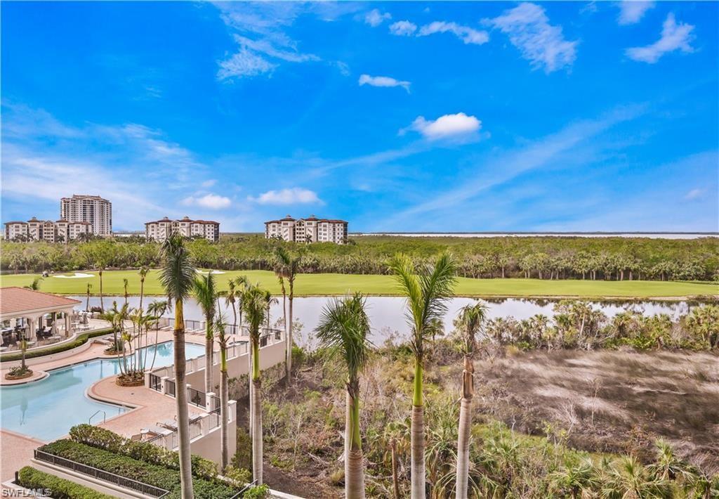 Waterfront--- Explore off season or pre-season in this luxury highrise. YES, you have water, pool, fountain & golf course views from this residence PLUS, this condo has been totally refreshed. All carpet removed & replaced with "wood look" tiles, the entire condo has been painted a light neutral color, to include the ceiling, NEW LED lighting, NEW chandeliers in dining & living areas, NEW water heater is now tankless, NEW entire condo water filtration system, NEW "quiet run" ceiling fans with DC motors, NEW motion sensor lighting, PLUS storm shutters on both balconies........... This luxury high-rise building offers a theatre, fabulous social room, fitness center, guest suites, owner air cooled storage. AVAILABLE FOR IMMEDIATE OCCUPANCY.. LEASE TO PURCHASE OPTION AVAILABLE. Master bedroom bed is available if you don't prefer your own bed.
