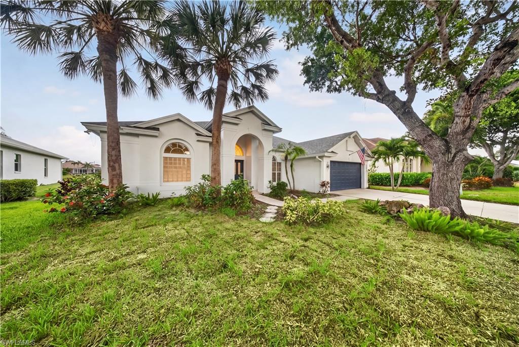This is the one you have been waiting for. A fully renovated 4 bedroom, 3 bath single story home in the gated community of The Orchards, set on a rare quarter acre pond view lot in the heart of North Naples. No pool to maintain. Just water views and total peace of mind.

Here is what makes it different: every major system is brand new and done right. New roof and a complete plumbing repipe, both permitted, inspected, and up to code. A brand new 5 ton Trane air conditioner with a 10 year transferable warranty. A newer water heater and a full repipe with no polybutylene. This is a 1995 home with brand new bones. You are buying peace of mind, not a project.

Step inside to soaring vaulted ceilings and a bright, open great room. The kitchen delivers with granite counters, a center island, stainless appliances including a new microwave and dishwasher, and pull outs in every lower cabinet. Fresh paint and new wide plank flooring run throughout. The primary suite is your private retreat with a spa style bath, dual vanities, a soaking tub, a separate walk in shower, and designer fixtures. A tray ceiling dining room, plantation shutters, and an elegant arched foyer finish the story.

Out back, your screened lanai overlooks a peaceful pond framed by fresh sod and mature royal palms, with room to add a pool.

Now the location. Gated Orchards on Vanderbilt Beach Road, about 12 minutes to Vanderbilt Beach and the Gulf, and minutes to Mercato, Waterside Shops, and I-75. All of it with one of the lowest HOA fees in Naples at roughly $545 a quarter, covering two community pools and spa, a remodeled clubhouse, fitness center, tennis, pickleball, bocce, basketball, and a playground.

The schools are elite: Pelican Marsh Elementary rated 9 out of 10 and top 5 percent in Florida, Pine Ridge Middle at 9 out of 10, and Barron Collier High. Naples was named the number one best place to live in America. And you are high and dry in an X flood zone, so no flood insurance required.

Here is the number that matters. A renovated home on this exact street right next door just closed for over $1.16 million. This one is priced at roughly $368 per square foot. Homes in The Orchards do not last. Come see it before someone else calls it home.