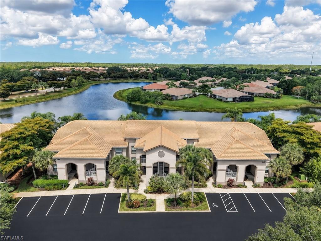 Welcome to this beautifully updated 2-bedroom plus den, 2-bathroom condo in the highly sought-after community of Bella Terra! This light and bright residence offers an inviting open-concept layout designed for comfortable Florida living. Large windows fill the home with natural light, while the screened lanai provides the perfect place to relax and enjoy peaceful views of the lake. The spacious kitchen offers ample cabinet storage, a breakfast bar, and a cozy eat-in dining area, making it ideal for both everyday living and entertaining. The primary suite serves as a private retreat with newly renovated flooring and a stunning updated en-suite bathroom featuring a standalone glass-enclosed shower with elegant marble walls. A generously sized guest bedroom and full guest bath provide comfort and privacy for family and visitors alike. This home is freshly painted throughout and comes with one assigned covered parking, ample guest parking, storage unit, and walking distance to amenities. Perfectly positioned overlooking the lake, this condo combines scenic views with an unbeatable lifestyle. Residents of Barletta of Bella Terra enjoy access to an impressive array of resort-style amenities, including a sparkling pool and spa, fitness center, basketball courts, sand volleyball courts, baseball field, walking and jogging paths, community garden, and more. Conveniently located along Corkscrew Road, Bella Terra offers easy access to shopping, outlet malls, dining, entertainment, I-75, RSW International Airport, and Southwest Florida's beautiful white-sand Gulf beaches. Don't miss this opportunity to own a move-in-ready condo in one of Estero's most desirable communities!