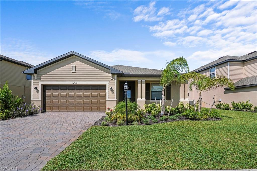 No Flood Insurance Required! Welcome to this 1-year old 3-bedroom, 3-bathroom home in the highly sought-after Portico community. This popular Lennar Venice model offers over 1,800 square feet of thoughtfully designed living space, combining comfort, style, and functionality.  Inside, the home feels bright and spacious, featuring large windows, soaring 10-foot ceilings, and an open-concept layout designed for modern living.
At the heart of the home is the expansive great room and chef-inspired kitchen, complete with white cabinetry,  granite countertops, and a full suite of stainless steel appliances and walk-in pantry. Sliding glass doors seamlessly connect the indoor living area to the covered lanai overlooking a scenic lake view. 
The split-bedroom floor plan provides privacy and convenience. The spacious primary suite features a large walk-in closet and a luxurious ensuite bath with dual vanities and oversized walk-in shower. The guest bedroom offers its own private ensuite bathroom with a shower/tub combination, while the third bedroom is conveniently located near the full guest bath.  Portico offers an exceptional lifestyle with low HOA fees and an impressive collection of resort-style amenities, including a clubhouse, community pool, fitness center, yoga studio, tennis courts, pickleball courts, basketball courts, and a playground.