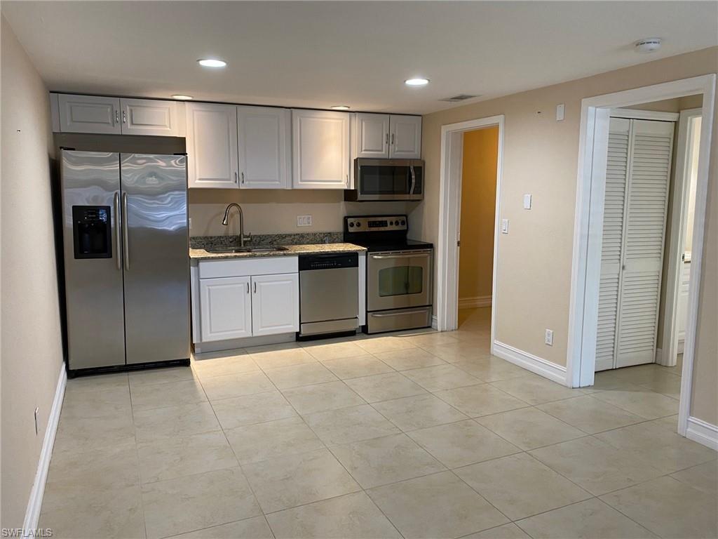 1 Bedroom / 1 Bath residence featuring a updated kitchen, granite countertops, and stainless steel appliances. Tile flooring runs throughout, complemented by a renovated bathroom and a convenient in-unit laundry room with washer and dryer. Enjoy a screened lanai with private porch entry—perfect for relaxing in the Florida breeze. 

Located in The Treetops at Naples, this community offers a prime location just minutes from Downtown Naples, world-class beaches, and Marco Island. An excellent opportunity for a rental investment or an ideal first home.
