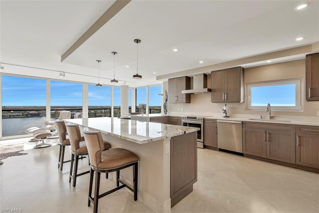 Looking for Beach, Shopping and Fine Dining HURRY TO THIS NEW IMPROVED PRICE spacious open floor plan condo which has been completely remodeled to perfection all the way to the studs. It's all about View & the Interior Finishes. Fabulous water views of beautiful Venetian Bay and the Naples skyline will take your breath away. Walls of glass to enjoy gorgeous sunrises & nightly panoramic views of the night lights. Enjoy daily boating activity and views of the Bay and City. The three in-suite bedrooms, 2 1/2 bathrooms makes for generous comfortable living and plenty of room for entertaining. Hurricane Impact Windows & doors, custom kitchen & bathroom cabinets with Quartz, Subzero refrigerator, Marble floors, Fiber Optics, Interior Solid wood doors and Hunter Douglas remote shades makes this residence one of the most desirable residences in the Allegro. As a resident of the Allegro you will enjoy secure covered parking, 24-hour front desk attendant, fitness center, social room, 2 large storage units and it is "PET FRIENDLY" living. Steps to the Beach, stroll to Venetian Village with 20 shops and 6 restaurants. Boat Docks are available for lease or purchase across the street on the Bay.