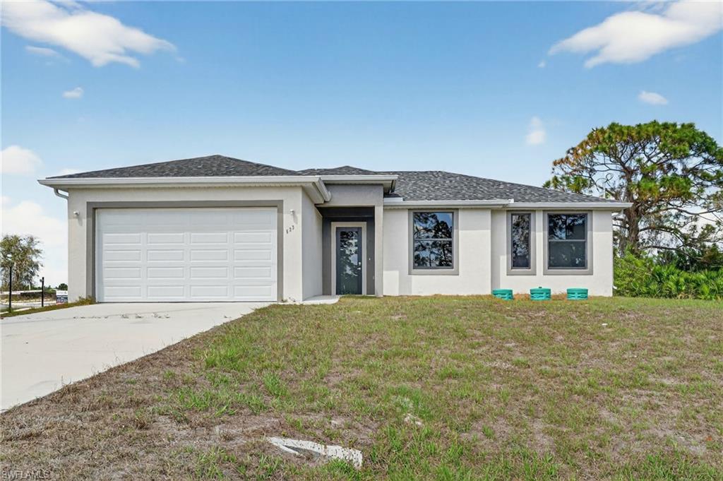 One or more photo(s) has been virtually staged, AI generated or rendered.  New Construction, almost completed. Enjoy peaceful mornings home featuring modern finishes and a comfortable, functional layout. All appliances are included. Close to everyday conveniences and surrounded by the growth that makes Lehigh Acres a great place to buy right now. Bring your highest and best offers! One or more photo(s) has been virtually staged, AI generated or rendered. Current photos from another project.