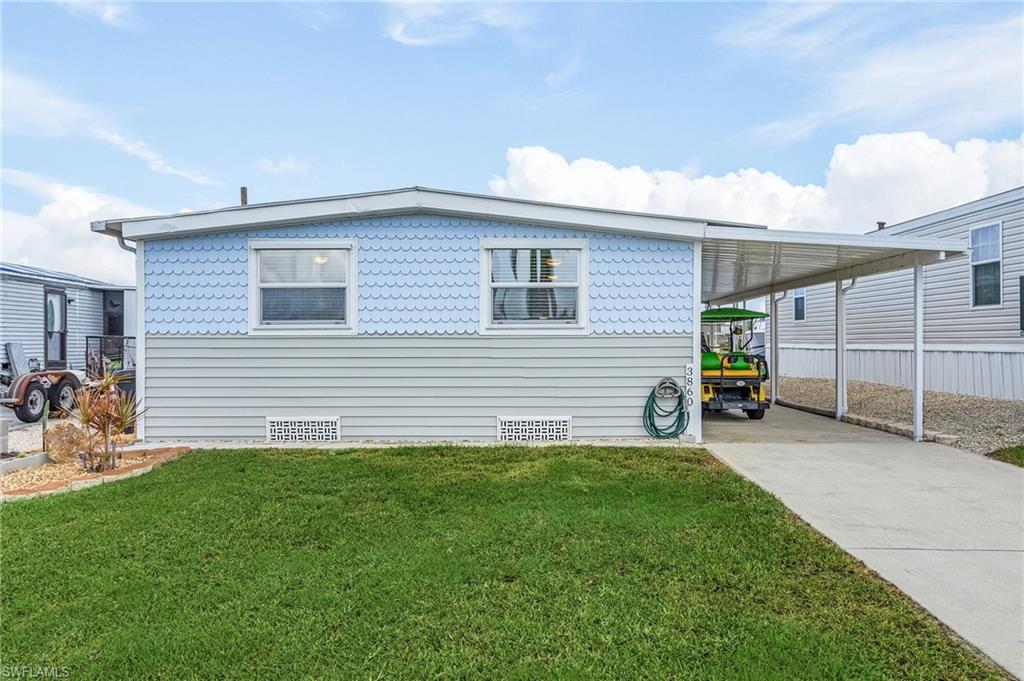 Start enjoying the island life in this newly remodeled water front mobile home on the south end of St. James City.  Completely remediated after Hurricane Ian.  Updates include brand new kitchen with solid surface countertops and stainless appliances, laminate flooring throughout, walls, insulation, and vanities in the bathrooms.  Brand new mini split air conditioning/heat system, and new landscaping.  Enjoy your morning coffee or evening cocktail and the canal views from the spacious window filled Florida room or the deck with a retractable awning and brand new bench seating.  L-shaped dock and boat lift with new remote, and a fish cleaning station.  Storage shed/workshop.  Washer and dryer conveniently located inside the home.  There is also a fabulous outdoor shower, perfect after a day out on the boat.  Offering deep water, and direct access to the Intracoastal the beautiful outer island beaches on the Gulf of Mexico, and some of the best fishing in SW Florida.  Walk, bike, or golf cart to all the local restaurants, bars, and shops.  Great for a winter/weekend getaway or a vacation rental.  Schedule your appointment today!