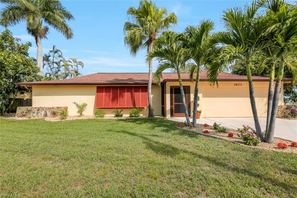 This is a must see! Beautiful updated home, new stainless steel appliances, freshly painted interior and exterior.
Pool liner replaced and lanai painted. This home has topnotch design and colors with an open floor plan that looks out to the oversized lanai and views of total privacy overlooking the golf course.  Exterior includes all new landscaping and new roof in 2014.  Every inch of this home has been done to perfection! You have to see to appreciate this absolutely beautiful home and setting.