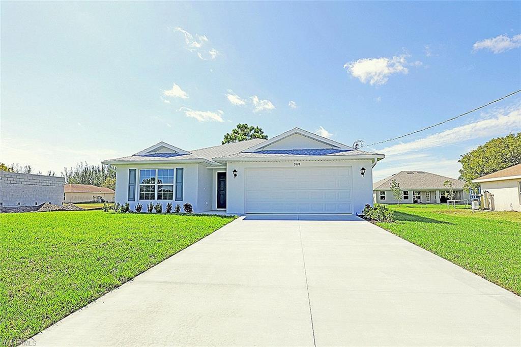 New construction!!   The Palm floorplan in the Signature Series. Beautiful 3 bedroom home. Home includes a 1 year warranty and a 10 yr structural warranty. Open floor plan with cathedral ceilings and center island kitchen.  Features include: Concrete Block Construction, under truss lanai, Lenox 15 Seer high efficiency AC system, Moen plumbing fixtures, Dimensional Shingles, PGT Low E Insulated windows, 30” upper cabinets, stainless steel kitchen appliance package, irrigation system, water treatment system, 18" tile in kitchen and baths, walk in shower in master bath upgraded to paver driveway. Pictures shown are of a completed home and features may differ. You will not find another new construction home at this price with this quality of construction.