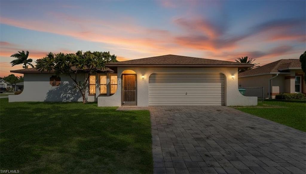 Welcome home to this charming pool home perfectly situated on a desirable corner lot in the heart of SE Cape Coral, just minutes from shopping, dining, and everyday conveniences. Whether you're a first-time homebuyer, seasonal resident, or looking to downsize, this home offers the perfect blend of comfort and convenience.

Inside, you'll find easy-to-maintain tile flooring throughout, stainless steel appliances, and a bright, inviting layout. Major updates include a newer roof (2022), giving you peace of mind for years to come. The attractive paver driveway enhances the home's curb appeal, while fully paid city water, sewer, and irrigation assessments add incredible value.

Step outside to your own private backyard oasis featuring a sparkling pool—perfect for relaxing, entertaining, or enjoying Florida's year-round sunshine. Best of all, this property is located in a zone where flood insurance is not required.

Opportunities like this don't last long. Schedule your private showing today and see why this could be the perfect place to call home!