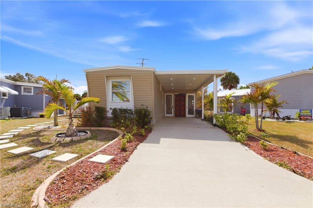 A unique opportunity awaits in the esteemed 55+ community of Holiday Park, where a spacious manufactured home awaits discerning individuals seeking a lifestyle replete with comfort, recreation, and social connection. This 3-bedroom, 2-bathroom residence, complemented by a versatile den, offers ample space for relaxation and entertainment. Notably, the property also features the convenience of RV or boat storage, catering to the enthusiast who desires to bring their recreational vehicle or watercraft into their leisure pursuits. Residents of Holiday Park enjoy access to an impressive array of amenities designed to foster a vibrant community spirit, including a heated community pool that beckons during the cooler months, shuffleboard courts for the strategically inclined, an exercise room for those committed to physical wellness, tennis courts for the athletically gifted, and pickleball facilities for the enthusiast of this increasingly popular sport. Furthermore, the community is enlivened by a calendar of events thoughtfully organized by the community's social committee, providing numerous opportunities for socialization and camaraderie among residents. As a haven tailored to the preferences and needs of the active 55+ demographic, this manufactured home in Holiday Park presents a singular chance to embrace a lifestyle that harmoniously blends leisure, fitness, and community engagement within a supportive and convivial environment.