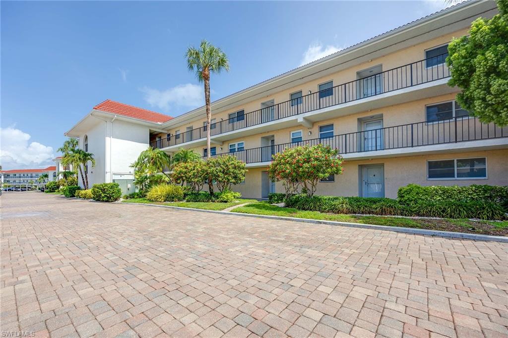 One or more photo(s) has been virtually staged, AI generated or rendered.  Available Jan or Apr, 2027. Escape to sunny Naples and enjoy your winter in this cozy, light and bright 2-bedroom, 2-bathroom condo in the highly desirable 55+ community of High Point Country Club. Located on the third floor, this inviting condo offers a spacious open floor plan with a comfortable sectional sofa, cozy chairs, and a wall-mounted TV—all just steps from the screened lanai where you can relax with your morning coffee or unwind in the evening while taking in serene golf course views. This all-inclusive bundled golf community features a 9-hole executive course with unlimited golf, as well as six community pools, tennis and pickleball courts, and a clubhouse complete with a pro shop, fitness center, and on-site restaurant. The primary suite offers a king-size bed, a wall-mounted TV, golf course views, and an en-suite bathroom with a walk-in shower. The guest bedroom is furnished with a queen bed and includes a dedicated workspace for those needing to stay connected. Make the most of Naples living in this amenity-rich, active adult community where every day feels like a vacation.
***Information contained herein deemed reliable but not guaranteed***