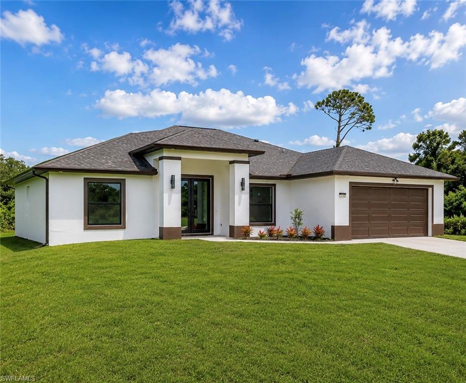 STUNNING NEW HOME on a prime corner lot. Featuring 4 spacious bedrooms plus a den, this home offers plenty of space for family, work, or guests. Porcelain floors run throughout the entire home, complemented by modern ceiling fans and lighting. The living room includes a cozy fireplace, perfect for relaxing. The kitchen is a chef's dream, with a large island, stainless steel appliances, and a fill pot sink, ideal for cooking and entertaining. Impact doors and windows add style, security, and energy efficiency throughout the home. The master suite is a private retreat, with a spa-style bathroom featuring a hydromassage shower, wall-mounted European toilet, and a vanity for makeup.
With room for a pool, mother-in-law suite, or boat/RV storage, an automatic sprinkler system, 2-car garage, and no HOA, this home is flexible and move-in ready. Conveniently located near Sunshine Blvd, Lee Blvd, schools, and shopping, it combines style, comfort, and easy access to all the amenities Lehigh Acres has to offer.