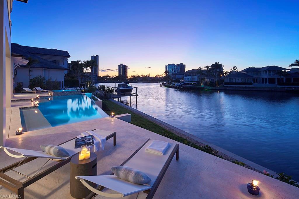 Located in the heart of Park Shore, just a quick golf cart ride away from the white sandy beaches and shops and dining in Venetian Village and Waterside Shops.