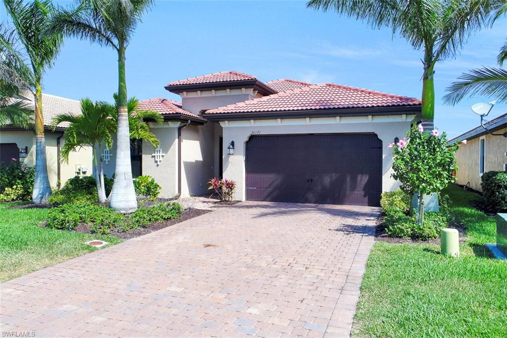 Lovely home located on a beautiful large lake front.  This is a most popular floor plan Asbury in Paloma with open  living space with many trays ceilings. Home features with many upgrades included tiles through out except the bedrooms, crown molding, granite counter tops, beautiful backlash, 42 inches cherry wood cabinet, slate kitchen appliances and many more. Paloma is a gated community with low HOA's fee. It is convenience located close to Coconut Point Shopping center, Southwest International Airport, FGCU, I75, beaches, many restaurants and shops.