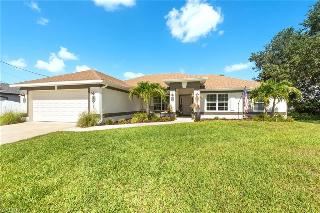 Welcome home to this beautifully upgraded 2020 single-family residence offering over 2,200 square feet of thoughtfully designed living space with 4 bedrooms, a den, and countless custom touches throughout. Every room has been enhanced with care, creating a warm and inviting home that is truly move-in ready.

One of the home's standout features is the fully paid-off solar panel system, providing exceptional energy efficiency and powering the entire home, with the current owner paying only the approximately $25/month LCEC meter fee. For added peace of mind, the home also includes a generator hookup for backup power.

Step outside and discover your own private backyard oasis. Designed for both relaxation and sustainability, the fenced yard features an irrigated garden, cozy firepit, storage shed, and an impressive collection of fruit trees, including an Ice Cream Banana tree, Jamaican Cherry tree, and Passion Fruit tree—perfect for enjoying fresh fruit right at home.

Conveniently located in Flood Zone X, this property does not require flood insurance, offering additional savings and peace of mind. Combining modern efficiency, exceptional upgrades, and a backyard designed for entertaining and enjoying Florida living, this home is a rare opportunity you won't want to miss.