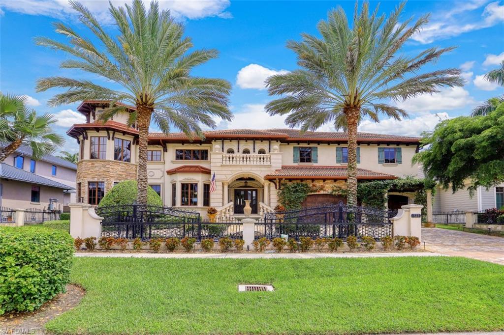 MOVE-IN READY TURNKEY HOME! Beautiful, Waterfront, Gated Property is loaded with Custom Craftsmanship from Travertine & Mahogany floors, Villa Style Finishes with Hammered Bronze Staircase, down to the Custom Hinges & DOGGIE DOOR. 5 MASTER SUITES: with Cable Ready TV's. 1st Floor Main Master has Private Lanai Entrance, His/Her Sinks, Walk In Closet, Soaking Tub and Walkthrough Shower with Steam feature. 2nd floor uncovered Balcony for sun lovers/stargazers. Custom Mahogany Library, Theater Room with refrigerator/freezer, Baby Grand Piano, Lanai Bar with Refrigerator, Sink & Ice Maker. Kitchen includes: French Door walk out to Lanai, 6-burner Stove Top, Pot Filler, Warming Oven, Sub-Zero freezer/fridge, Dishwasher & new Disposal. 3 car garage has additional refrigerator/freezer & brand new cabinetry. Electronic screened Lanai features a bar, TV & New Grill. Recently Poured Heated Uncovered Pool features a Waterfall Spa. Sprinklers, timer controlled landscape & dock lighting. Gulf access dream dock includes 2 remote controlled boat lifts & R/C Jetski/Kayak lift With 2 Kayaks. This home has survived Hurricanes Ida, Ike, Irma and Ian! Hurry on this one before it's gone!