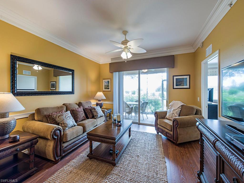 C.13346 - This sunny and beautiful 1st Floor Condo is being offered Turnkey and offers both a view of the golf course and the Lake.  Use the Championship golf course, tennis courts, fitness center, 3 community pools, and walk to socialize and enjoy your meals and the clubhouse year round.  It is conveniently located to I 75, the airport, beaches, restaurants, and shopping.  Parking is plentiful with your own carport and guest parking area.
