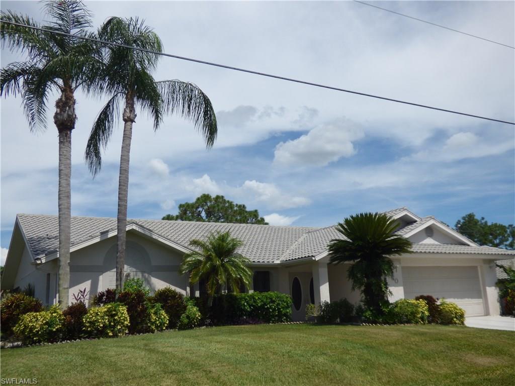 Large, beautiful home in Country Club Estates!  Enter your new home through a double door entry with etched glass and continue on to the gorgeous Bordeaux granite kitchen with pass-through to lanai (10X30) over looking the canal.   Split bedroom plan with master bedroom suite featuring a jetted tub & separate shower with double sinks & granite counter-tops.  New air-conditioner, new hot water heater and new microwave!  Plenty of room for your family and  entertaining!  Come see this well-cared for home that's close to shopping, churches, airport, restaurants and so much more!