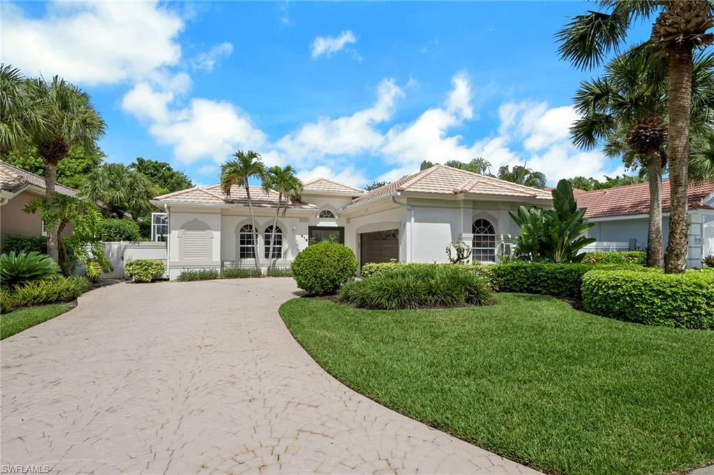 Exquisite Estate Home in Eagle Creek Golf & Country Club, Naples, Florida This beautifully maintained 3-bedroom, 3-bath executive residence is nestled within the exclusive estate section of Eagle Creek Golf & Country Club. Designed for both comfort and sophistication, the home features a private pool and spa, a den/home office, and a spacious laundry room. The oversized two-car garage includes built-in storage closets and shelving for added convenience.The primary suite offers a true retreat with his-and-hers walk-in closets, a soaking tub, dual vanities, and elegant finishes throughout. The property is offered turnkey furnished and is move-in ready, making it the perfect opportunity for immediate enjoyment. Ideally situated just ten minutes from both downtown Naples and Marco Island, this home provides easy access to the best of Southwest Florida living. Residents of Eagle Creek enjoy an unparalleled lifestyle with access to a full-service clubhouse and fine dining, five Har-Tru tennis courts, four Har-Tru pickle ball courts, three grass bocce courts, and a junior Olympic-sized pool complemented by the Crystal Lake Café for outdoor dining. Additional amenities include fitness and wellness classes (yoga, barre, and strength training), a modern fitness center, massage therapy and spa services, and a state-of-the-art driving range. This home includes a Social Sports Membership, with the exciting opportunity to upgrade to Eagle Creek’s highly sought-after Tier II “Golf in Waiting” program — unlocking the ability to enjoy golf year-round. Don’t miss this exceptional opportunity to experience the perfect blend of luxury, leisure, and lifestyle at Eagle Creek Golf & Country Club.