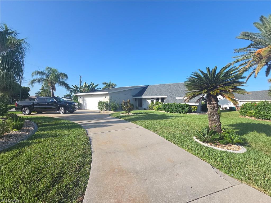 Water views from this Just updated Se Cape Pool Home. With its open floor plan 3 Bed 2 Bath. Expansive screened leni for entertaining. Huge Kitchen Dinning center Isle for your gatherings. Come see you won,t be disappointed.
Pool and lawn care included.