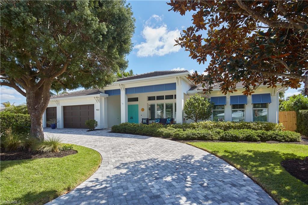 Surrounded by lively greenery and enveloped in nature's embrace, this secluded oasis is ideally located in Park Shore.