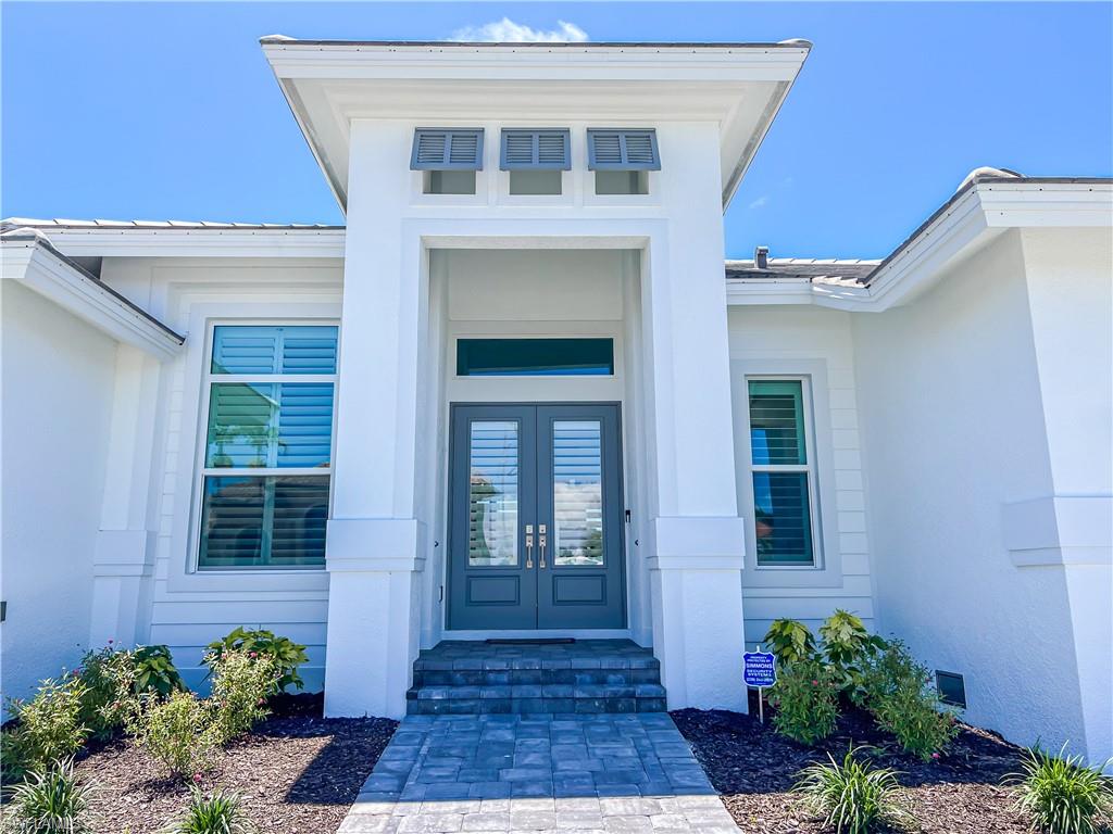 Like-new and move-in ready! This immaculate, bright, and spacious 2023 home offers contemporary coastal living in the heart of Marco Island. Featuring 3 bedrooms plus a den, an open-concept floor plan, stylish furnishings, and southern exposure, this residence is designed for comfort and entertaining. Relax by the heated pool and spa, enjoy the built-in BBQ and screened lanai, and appreciate the peace of mind that comes with impact-resistant windows and modern construction standards. Just minutes from Marco Island's renowned white-sand beaches, waterfront dining, shopping, and outdoor recreation.
