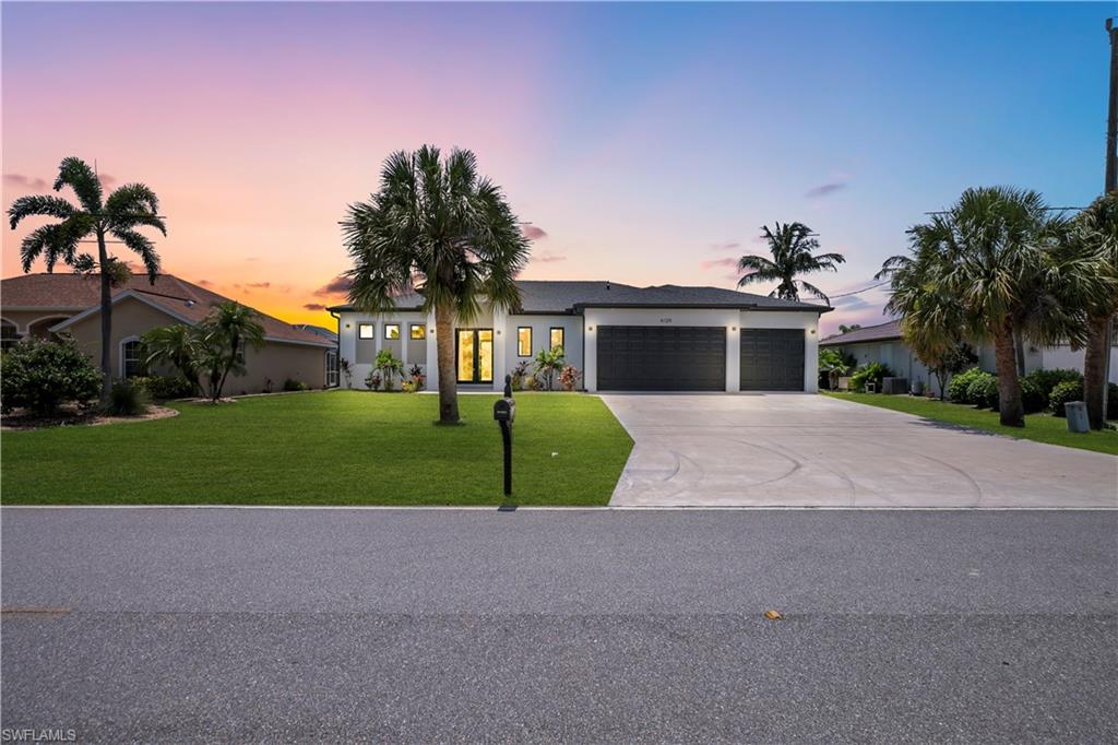 Luxury Waterfront Living | Gulf Access | Sailboat Water | Built in 2024

Move right into this stunning 2024 contemporary coastal waterfront home in Port Charlotte! Offering direct Gulf access on sailboat water with no bridges, this exceptional property is a boater’s dream. With no HOA, no deed restrictions, and county water and sewer, you’ll enjoy both freedom and convenience.

This thoughtfully designed home features 3 bedrooms, a dedicated office/bonus room (possible 4th bedroom), 2 full baths, 1 half bath, and a spacious 3-car garage. The open-concept floor plan showcases 10-foot ceilings, coffered ceilings in the great room, dining area, and primary suite, and beautiful 24” x 24” tile flooring throughout.

The gourmet kitchen is designed to impress with a waterfall-edge island, breakfast bar, pendant lighting, stainless steel appliances, built-in oven and microwave, cooktop with vent hood, and abundant cabinet space.

The spacious primary suite offers private lanai access, two walk-in closets, and a luxurious ensuite featuring dual vanities, a freestanding soaking tub, oversized walk-in shower, private water closet, and linen closet. Two additional bedrooms, a guest bath with dual sinks, and a convenient pool bath complete the interior.

Enjoy true Florida living from the covered screened lanai featuring brick pavers, an outdoor kitchen, and a heated pool with sun shelf overlooking the canal. Additional highlights include impact windows, an interior laundry room with utility sink, epoxy-coated garage floors, professional landscaping with irrigation, and an 80-foot concrete seawall. Boat, fish, or cruise directly from your backyard to Charlotte Harbor and the Gulf of Mexico. Conveniently located near Gulf beaches, barrier islands, golf courses, shopping, dining, Sunseeker Resort, Downtown Punta Gorda, Fishermen’s Village, and US-41. Luxury, location, and the ultimate waterfront lifestyle—this exceptional home is ready to welcome its next owner. Schedule your private showing today!