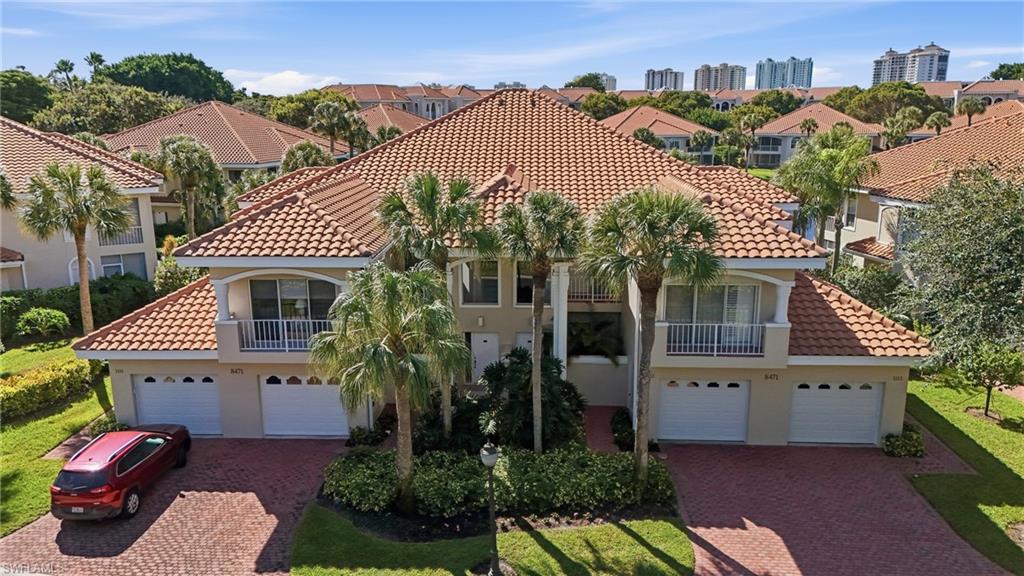 Discover a rare opportunity to own a serene, luxury residence in the highly sought-after Crescent community of Pelican Bay. Perfectly positioned for effortless living, this first-floor condo combines peaceful water views, lush landscaping, and unmatched community amenities—creating the ultimate Naples retreat. Follow the charming brick pathway to your private entry and step into an open, light-filled living space. Expansive sliders capture tranquil water views and a calming water feature, offering a soothing backdrop from sunrise to sunset. Enjoy fresh breezes from the screened lanai—your own private sanctuary ideal for morning coffee, evening cocktails, or simply unwinding in total peace. This lovingly maintained home features an open main living area with abundant natural light, a spacious kitchen with plenty of room to customize, a large laundry room, a generous primary suite with two closets, walk-in shower, and extended vanity space. Living in Crescent means you’re just steps from the best of Pelican Bay: Easy walking access to the tram, community center, fitness center, tennis courts, and pickleball. Exclusive Pelican Bay amenities including attended private beaches, restaurants, kayaks, biking and jogging paths, and vibrant community events. You also benefit with close proximity to Waterside Shops, dining, and culture. Beautifully cared for over the years, this condo is an exceptional opportunity—whether you’re seeking a turnkey retreat, a seasonal getaway, or a canvas to reimagine with your personal style.
