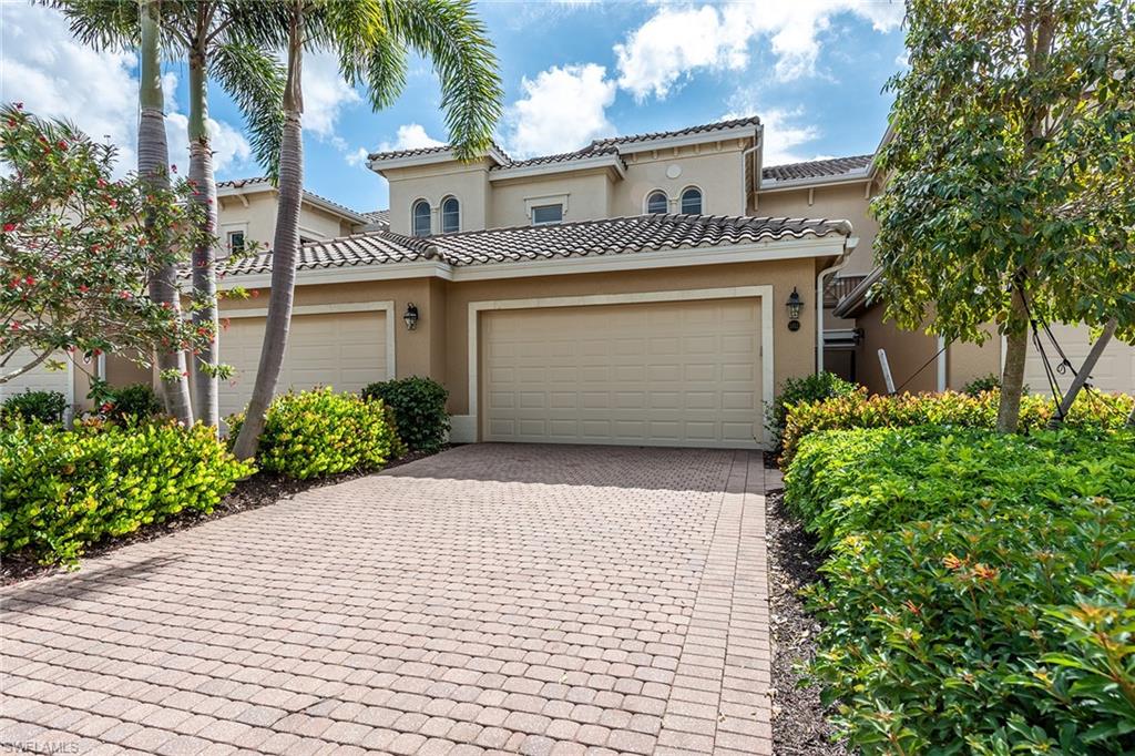 Treat yourself to magnificent lake views and Florida’s tropical sunrises, sip a refreshing cup of coffee in your private courtyard and seamlessly entertain guests in your expansive tiled lanai. This three-bedroom, three-bath unit offers an abundance of desirable features such as volume ceilings, crown molding, two-car garage and laundry room with a tub. The AC was replaced in January of 2019! The kitchen boasts granite countertops, light wood cabinetry, and GE Profile appliances including a coveted gas stove and panel covered refrigerator. Access the lanai from the master bedroom, living room, and family room. The master bedroom is soaked in natural lighting and boasts large walk-in closets and an en-suite bath with dual sinks, ample counter space, water closet and separate walk-in shower and tub. Furnishings are negotiable. Enjoy your spacious floor plan located in the private community of Marengo in Fiddler’s Creek, where residents enjoy excellent amenities including fitness, tennis, dining, spa services, resort-style pools and extensive activities and events. Optional golf, marina, and beach memberships are available.