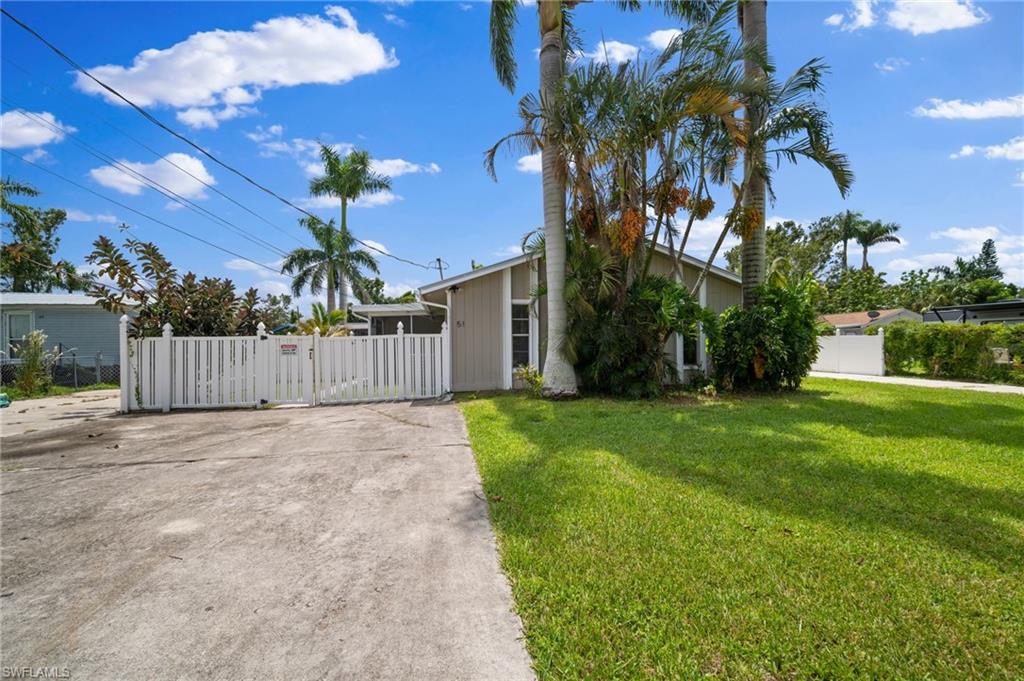 This great investment property is located at 51 Lake St, North Ft. Myers. Situated in a desirable location, this property offers immense potential for investors. Fully renovated ($100,000 +/-) in 2023 with 2 new AC, 2 walk in laundry rooms, granite counter tops, 2020 metal roof, and 2 large driveways w/ 2 car detached garage & Shed. This duplex offers a 3/2 on one side and a 2/1 on the other side with a 2 car detached garage and large store shed, this offers the perfect opportunity for an owner/user to collect rent! Upon entering, you are welcomed into a bright and inviting living space that is perfect for relaxation and entertainment. The well-appointed kitchen boasts modern appliances, ample storage space, and a convenient layout. The bedrooms are generously sized, providing comfortable living spaces for residents or tenants. The bathrooms are thoughtfully designed with modern fixtures and finishes, ensuring a luxurious experience. One of the standout features of this property is its outdoor area. Whether you are looking to expand your investment portfolio or create a comfortable home for your family, this great investment property at 51 Lake St.