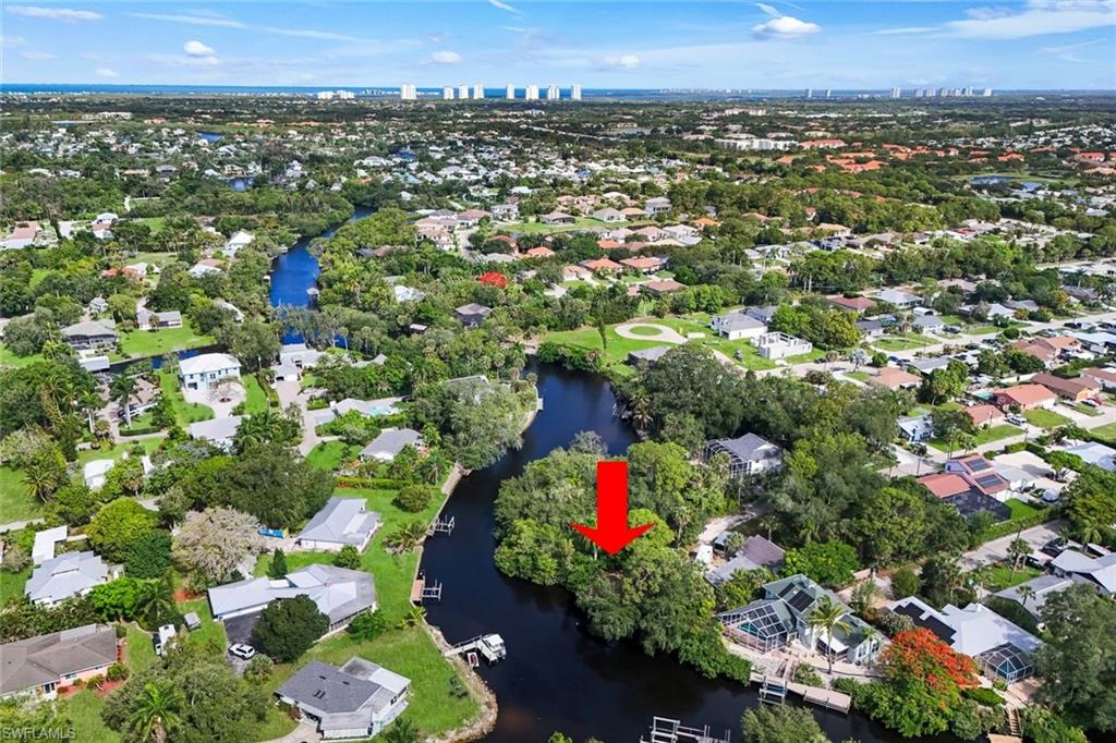 THIS is the PEFECT LOCATION to build your GULF ACCESS DREAM HOME! Located directly on the Imperial River…you DO NOT want to miss this opportunity. This OVERSIZED CORNER lot is just a short walk, bike ride, kayak ride, or boat ride to Downtown Bonita, restaurants, grocery and entertainment. Picture cool winter mornings sipping coffee on your future lanai or dock while visiting with dolphins and manatees and waving to neighbors passing by on their boats. Spend your days exploring the backwaters or private beaches – only accessible by boat. The sky is awash with color every evening with optional southwestern exposure for your future home. Enjoy a casual lunch or leisurely cocktail at one of the many famous waterside restaurants – ALL accessible from YOUR backyard! There is NOTHING not to LOVE about this location. THIS is what SWFL living is all about! Bring YOUR BOAT and head to the Gulf - your opportunities are ENDLESS! The burgeoning Downtown Bonita Springs boasts eclectic restaurants, coffee/wine bars, craft cocktail bars, craft breweries, music venues AND MORE TO COME! The arts are alive in Bonita, with plenty of festivals, artist cottages, music in the downtown amphitheater. PLUS - you are only a short drive to Downtown Naples, Fort Myers Beach and RSW International Airport. DO NOT miss YOUR opportunity to experience all that Bonita Springs has to offer, especially your opportunity to BUILD your DREAM HOME in your DREAM location!