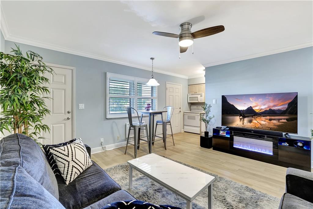 Discover the ultimate island get away with this charming 1-bedroom, 1-bath condo, offering an unbeatable combination of affordability, convenience, and direct access to Marco Island's coveted Resident's Beach. Whether you're seeking a sun-drenched winter escape from the North or a budget-friendly path to beach access as a Southwest Florida local, this furnished, and tastefully appointed condo is an absolute dream. Step inside and admire the seamless flow of luxury vinyl flooring throughout, complemented by elegant crown molding and stylish plantation shutters. Updated ceiling fans add to comfort and aesthetic appeal, ensuring you'll instantly fall in love with its prime location and fantastic amenities. Imagine waking up and being just steps away from the pristine sands of Marco Island's Resident's Beach! As a member, you'll enjoy exclusive access to a wealth of amenities including relaxing tiki huts, spacious picnic areas, and a beloved local's favorite beach food hut. Families will appreciate the newly updated children's play equipment, while monthly music events during season add to the vibrant atmosphere. Beyond the beach, a culinary adventure awaits directly across the street. Indulge in local favorites like Doreen's Cup of Joe, Sami's, Thai Sushi, Joey's Pizza, Verdi's, La Mesa Taqueria, and Empire Bagel, all just a short stroll away. This condo isn't just a home; it's a lifestyle. Offered fully furnished, it's ready for you to move in and start enjoying the Marco Island dream from day one. Don't miss this opportunity to own your piece of paradise!