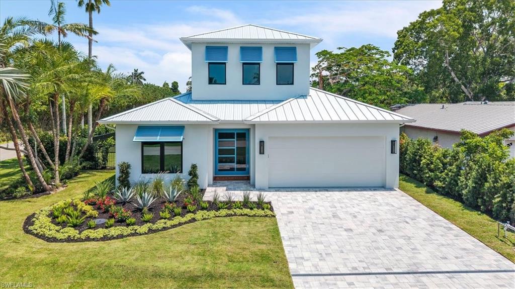 Welcome to the PALM HAVEN floor plan w/ almost 3700 ft.² of indoor living space! This BRAND NEW coastal modern home sits on an X-FLOOD ZONE lot just 1.2 miles from the BEACH!!! Beautifully appointed w/ engineered HARDWOOD floors, WOOD BEAMS, HUGE PIVOTING front door, TONS of STORAGE & high end finishes + some surprises your FAMILY will love! Boasting of it’s 5 BEDROOMS all w/ custom WALK-IN CLOSETS, 5 1/2 BATHROOMS, BONUS ROOM w/ large wall games, tandem 3 CAR GARAGE w/ side mount opener & professionally painted epoxy floor. Other features include GAS living thru-out the home + generator ready, standing seam METAL roof, INSULATED IMPACT windows & doors, POOL & SPA, OUTDOOR KITCHEN & FIREPLACE, 48” SKS double oven range w/ griddle, 48” SKS refrigerator w/ 2 different ice cubes INCLUDING LARGE BALL cubes, LG SIGNATURE SERIES washer & dryer, 2 buffet bars one w/ wine & other w/ beverage fridge + loads of cabinets, custom WALK-IN PANTRY, automated ESPRESSO/CAPPUCCIO MACHINE, fully FENCED yard, custom mailbox & SO MUCH MORE!!! This floor plan is fantastic w/ its primary suite & another bedroom suite downstairs. Escape to your primary bathroom w/ oversized vanities, bidet, WET ROOM w/ stone tub, rain head shower + JETS -OR- head upstairs to the extra entertaining space -OR- watch the SUNSET on the balcony. 
The PALM HAVEN home has so much to see + an AMAZING LOCATION downtown surrounded by GREAT restaurants, shops & parks…Book Your Showing Today!