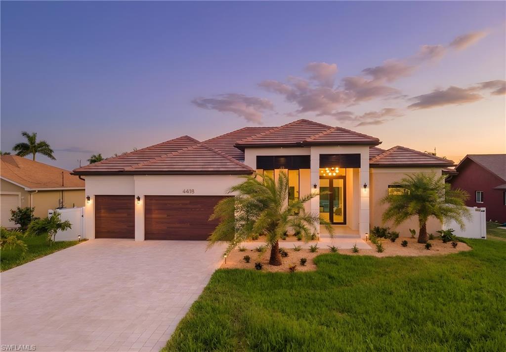 Experience luxury living in this stunning new construction single-family home offering 2,818 square feet of thoughtfully designed living space. This exceptional residence features 4 spacious bedrooms, 3 full bathrooms, 1 half bath, and an expansive open-concept floor plan enhanced by soaring ceilings, elegant Spanish porcelain tile, custom wood accents, and integrated Sonos sound throughout the home.

The gourmet chef’s kitchen is a true centerpiece, showcasing premium DACOR appliances, a modern wine display, designer bar area, and breathtaking Cristallo stone countertops. The seamless indoor-outdoor design is perfect for entertaining and everyday living.

Step outside to your private resort-style oasis featuring a sparkling pool, relaxing spa, outdoor kitchen, outdoor shower, and pool bath, creating the ultimate Florida lifestyle experience. Additional highlights include a spacious 3-car garage, luxurious finishes, and impeccable attention to detail throughout.

Ideally located in the highly desirable Southwest Cape Coral area, this home offers convenient access to shopping, dining, grocery stores, marinas, healthcare facilities, and entertainment. Enjoy being just minutes from Publix, popular restaurants, Cape Harbour, and some of the area’s most sought-after amenities.  

This is a rare opportunity to own a sophisticated new construction home that perfectly blends luxury, comfort, and location.