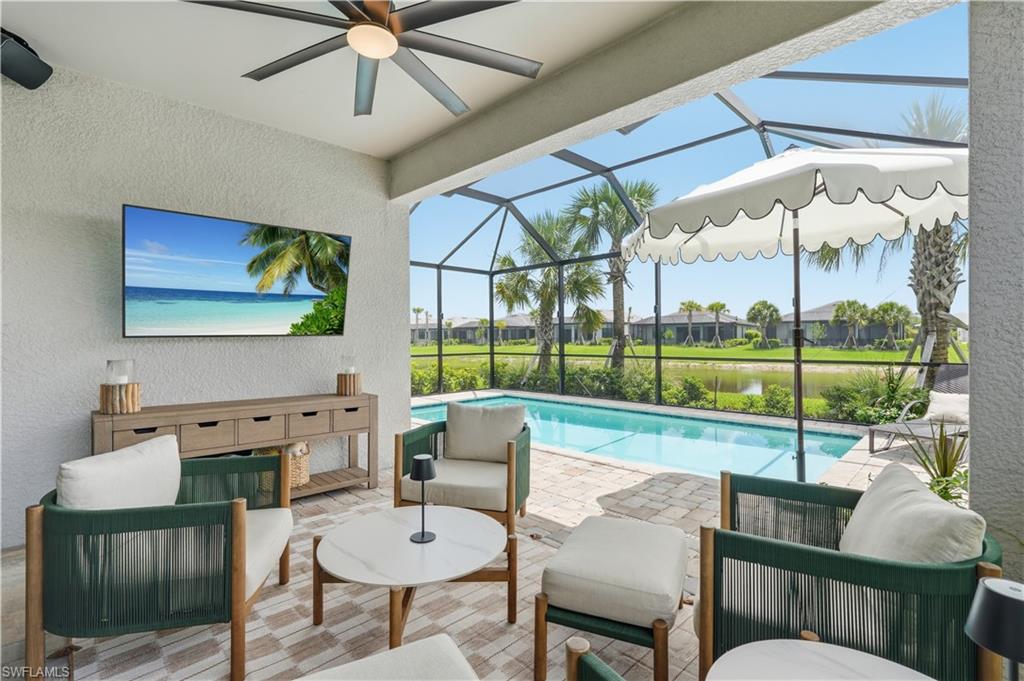Pool home with water view! This exceptional 3 bed 2 bath Hallmark floor plan is a blend of style, comfort, and functionality! Furniture optional, this home is truly move-in ready and showcases numerous designer upgrades throughout. The thoughtfully designed interior features custom closet systems, plantation shutters, modern lighting fixtures, and an open-concept layout that feels bright and welcoming from the moment you enter. The spacious great room flows seamlessly into the kitchen and dining areas, creating the perfect space for both everyday living and entertaining. Step outside to enjoy the home’s most captivating feature, a beautiful pool overlooking a serene water view. With desirable sun exposure throughout the day, the outdoor living area feels bright and inviting while providing the ideal setting for relaxation or hosting guests. Located within Terreno, one of Naples newest resort style communities, residents enjoy an exciting collection of amenities designed for an active and social lifestyle. The loved Olive & Thyme restaurant sits aside the resort style pool, giving the feeling of vacation every day. Additional amenities include lap pool, spa, clubhouse, fitness center, pickleball, tennis courts, dog park, play ground and an extensive calendar of social activities. With all the new developments surrounding this community, Terreno is the place to be! Known for having only 648 single-family homes with a huge 15,000 sqft Clubhouse this community is super unique!