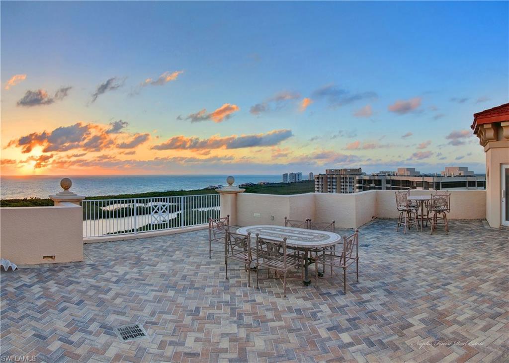 C.13569 - Exquisite penthouse with artistic, handcrafted moldings by an internationally recognized master carpenter in the masterpiece building, Cap Ferrat.  This luxury home has stunning views horizon-to-horizon with 7 screened/open terraces plus roof decks with wine bar, sauna, spa and crows nest with fireplace. Living area has private spaces and gathering places catering to every need. Fine design features with crystal chandeliers, beveled mirrors, and delicate hand-painted accents create an ambiance of unparalleled excellence. Cap Ferrat has private elevator entry, 3 parking spaces and steps-away access to the incomparable white sand beach amenities including 2 private beach pavilions with indoor/outdoor dining and lounge/umbrella service. Other private Pelican Bay amenities include 18 tennis courts, state-of-the-art fitness center and much more. The Club Pelican Bay offers equity membership to Arthur Hills designed 27-hole golf course. Newly constructed Clubhouse has a sweeping 2-story entrance and verandas creating elegant beach-plantation feel. Public amenities within Pelican Bay include world-class entertainment, art and shopping facilities plus two 5-Star hotels.