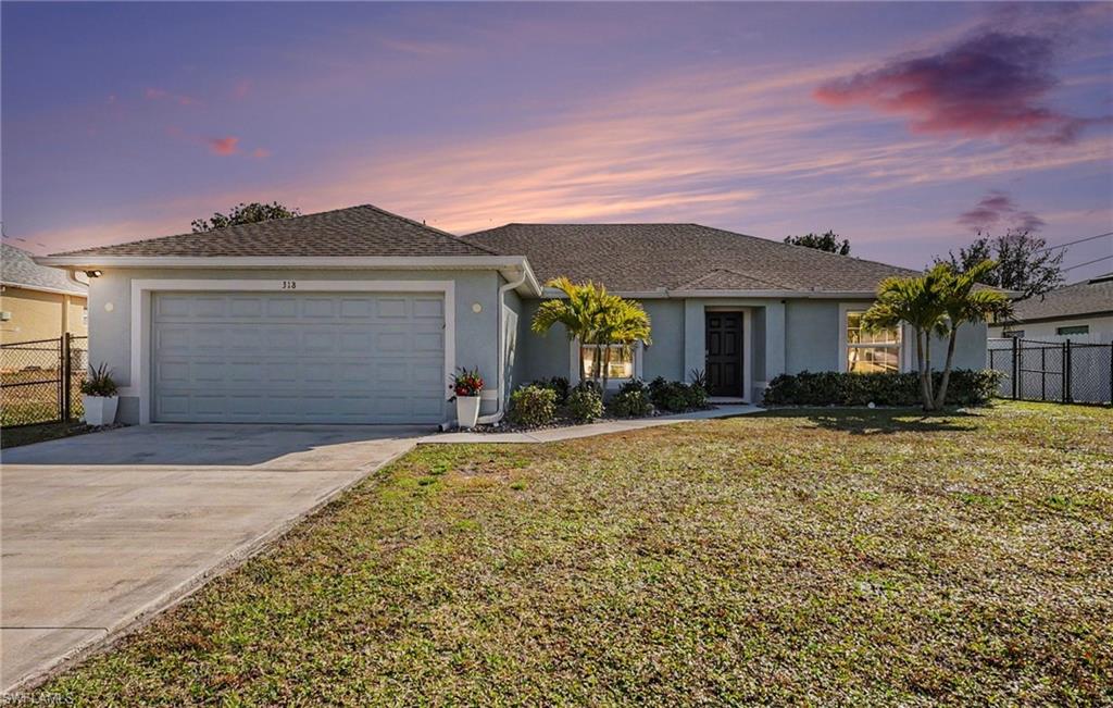 Discover the dream of Southwest Florida living in this stunning, turn-key 4-bedroom, 2-bathroom home nestled in the heart of Cape Coral. Built in 2022, this property boasts an array of premium upgrades and is meticulously maintained, offering a blend of modern luxury and unparalleled peace of mind. Prepare to be wowed by the vaulted ceilings that soar above the dining room, kitchen, great room, and master bedroom, creating an open, airy ambiance perfect for entertaining and everyday life. Gourmet Kitchen & Baths: Enjoy the elegance of premium Granite countertops throughout the kitchen and both bathrooms. The kitchen features spacious 42" upgraded cabinets and a suite of sleek Stainless Steel appliances. Elevated Comfort: Both bathrooms are equipped with raised 36" vanities. Outdoor Oasis: Step onto your expansive lanai and extended patio, both finished with upgraded pavers, creating a beautiful and durable space for enjoying the Florida sunshine. The backyard is fully fenced-in, providing a private and secure area for pets and play. Smart & Secure: Enter with ease using the keypad lock on the front door. Upgraded window covers, including an automatic shade for the slider, offer convenience and energy efficiency. Climate & Security Peace of Mind: The home is protected by a Whole Home Surge Protector and an AC Unit Surge Protector. Crucially, it's equipped with a Generlink hook up, making the entire house generator-ready. Ceiling fans in every bedroom, including the lanai, ensure comfort year-round. Living in Cape Coral means year-round access to a vibrant, active, and waterfront community. You're never far from adventure. Explore the extensive canal system or visit the Four Mile Cove Ecological Preserve for kayaking and nature trails. You can also take a Sunset Dolphin Cruise or head to the nearby Yacht Club Community Park for a small beach and river views. Cool off at the thrilling Sun Splash Family Waterpark or enjoy go-karts, mini-golf, and zip-lining at Gator Mike's Family Fun Park. Discover local history at the Cape Coral Historical Museum or explore the local arts scene at the Cape Coral Art League. You can also visit the Tom Allen Memorial Butterfly House for a unique experience. Enjoy fresh seafood with stunning views at waterfront restaurants like Rumrunners. Tee off at championship courses such as the Coral Oaks Golf Course. This home is perfectly positioned to offer a premium living experience with immediate access to everything that makes Cape Coral one of the most desirable cities in Florida! Washer and Dryer excluded from sale.