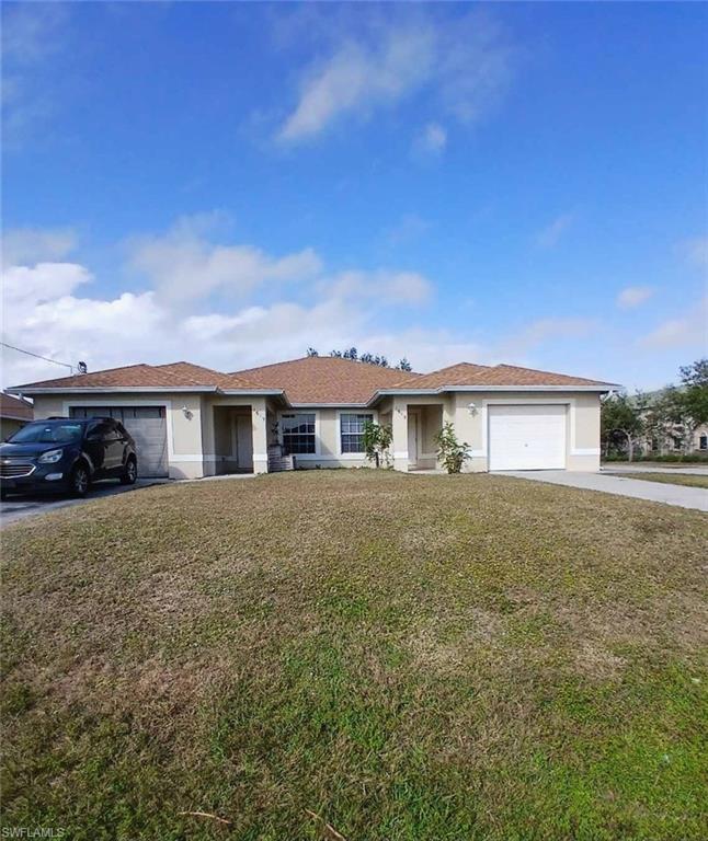 Beautifully maintained duplex on a corner lot, New Kitchen cabinets and granite counter tops, new roof 2022, HVAC 2021. Tile floor throughout, vaulted ceilings and freshly painted inside.