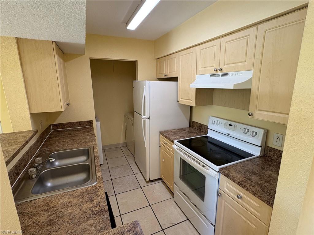 Enjoy comfortable living in this charming 1-bedroom, 1-bathroom second-floor condo located in a highly desirable central area, just minutes from shopping, dining, entertainment, and major roadways. This well-maintained unit features tile flooring throughout, a spacious layout, and the convenience of an in-unit washer and dryer. Relax on your private balcony and enjoy the community's amenities, including a sparkling swimming pool and fitness center. Pet-friendly and ideally situated, this condo offers the perfect combination of comfort, convenience, and lifestyle.