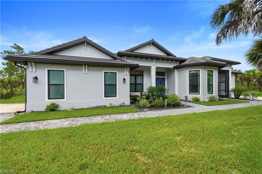 Private 2.73-Acre Estate with Next Gen Suite, Saltwater Pool & Full Storm Resilience
Set on a fully upland 180' x 660' lot, this estate offers rare space, privacy, and thoughtful engineering rarely found together in Southwest Florida. The land has been cleared and graded, giving you a blank canvas of usable acreage alongside a meticulously finished home.
Main Residence
The heart of the home is a custom kitchen featuring a 5-inch waterfall island, farmhouse sink, and a hidden coffee bar tucked out of sight for everyday convenience. Gas service runs to the main kitchen, the outdoor kitchen, and an on-demand hot water heater, while every bedroom enjoys its own en-suite bath. Each bathroom features a beachfront-entry shower and American Standard toilets with concealed trap way and Ever Clean surface technology — a clean, modern touch throughout.
Outdoor Living
Step outside to a saltwater pool with a sun shelf, bubbler feature, and in-pool lighting — plus a no-slip tile pool bath for easy indoor-outdoor living. The outdoor kitchen extends entertaining space well beyond the lanai.
Next Gen Suite
A true home-within-a-home: private double-door entrance, its own screened lanai, full kitchen, one-car garage, and a stacked washer/dryer tucked into the bedroom closet — ideal for multigenerational living, guests, or rental flexibility.
Garage & Storage
The main two-car garage is insulated and wired for AC, with piping already in place for future installation, plus custom shelving, a garage refrigerator, and an extra freezer — as functional as it is finished.
Built for Peace of Mind
This home is equipped for true self-sufficiency and storm readiness: a whole-house generator, 1,000-gallon in-ground propane tank, hurricane-rated windows and doors, full gutter system, Starlink internet, and a whole-home alarm system. Extra parking accommodates boats, RVs, or guests with ease.