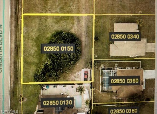 Great Oversized Triple Lot in Beautiful Cape Coral Florida. This Lot features Eastern Exposure and is close to Shopping. Build your dream home today! This lot is between one New Home currently being built and another house that is fairly newer. Call today for more information on this lot. Come live the Cape Coral, Florida Lifestyle today!