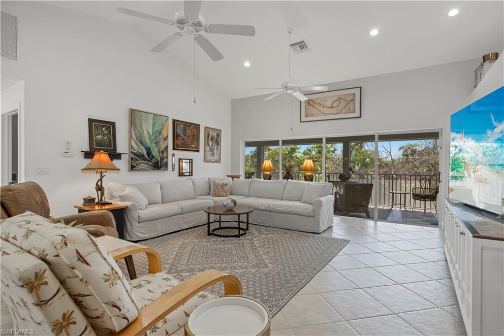 Your perfect Island getaway only minutes to the white sands of Algiers Beach! Elevated 3 bedroom 3 bath home is nestled in a peaceful Olde Florida neighborhood that is centrally located and close to shopping, dining and grocery.   The home boasts an open floor plan with tile flooring, shiplap wall, vaulted ceilings, and updated kitchen giving it an open airy feel.  This 2000 home has impact windows & garage doors. New roof and new siding. Bahama shutters, plus hurricane shutters.  Large open space downstairs with storage for all your island toys plus an oversize garage/workshop.  All three bedrooms are ensuite with pocket doors off 2nd and 3rd bedrooms.  Pocket sliding glass doors off master bedroom, great room and 2nd bedroom onto 9ft wide screened upper deck overlooking pool. Oversized lot at the end of shell road adds more privacy.  Relax with morning coffee on the screened front porch viewing the sunrise.  Move in ready. Now's your chance to live on Island time. New Culligan water system. New AC. Lot to south of home cannot be built on or improved.