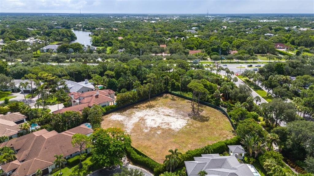 PELICAN BAY WOODS - Land