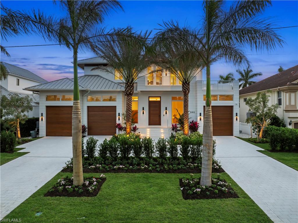 Introducing an exceptional waterfront estate in Aqualane Shores, this meticulously crafted home, designed by Antoine Testard Design and built by BBA Construction, offers 5,089 sqft of luxurious living space. Featuring 4 bedrooms, charming bunk room, 5 full bathrooms with additional powder and pool bath, enclosed office, and first-floor master suite. Custom cabinetry by New Style Cabinets, Legno Bastone White European oak floors, and reflective ceiling details throughout, every detail is thoughtfully executed. The open-style kitchen, with high-end Miele and Sub Zero appliances and an elegant island. Modern conveniences include Lutron lighting, Elan g home automation, full home generator, and automatic hurricane shutters and screens for peace of mind. The exterior boasts an Ipe wood dock, direct bridge-free Gulf access, plus a three-car garage that can accommodate multiple car lifts for practical storage. Ideally located, this property is a short walk from the historic 3rd Street South district, Naples Pier, and the Naples Yacht Club, making it perfect for those seeking luxury living with the best of Naples' lifestyle at their doorstep.