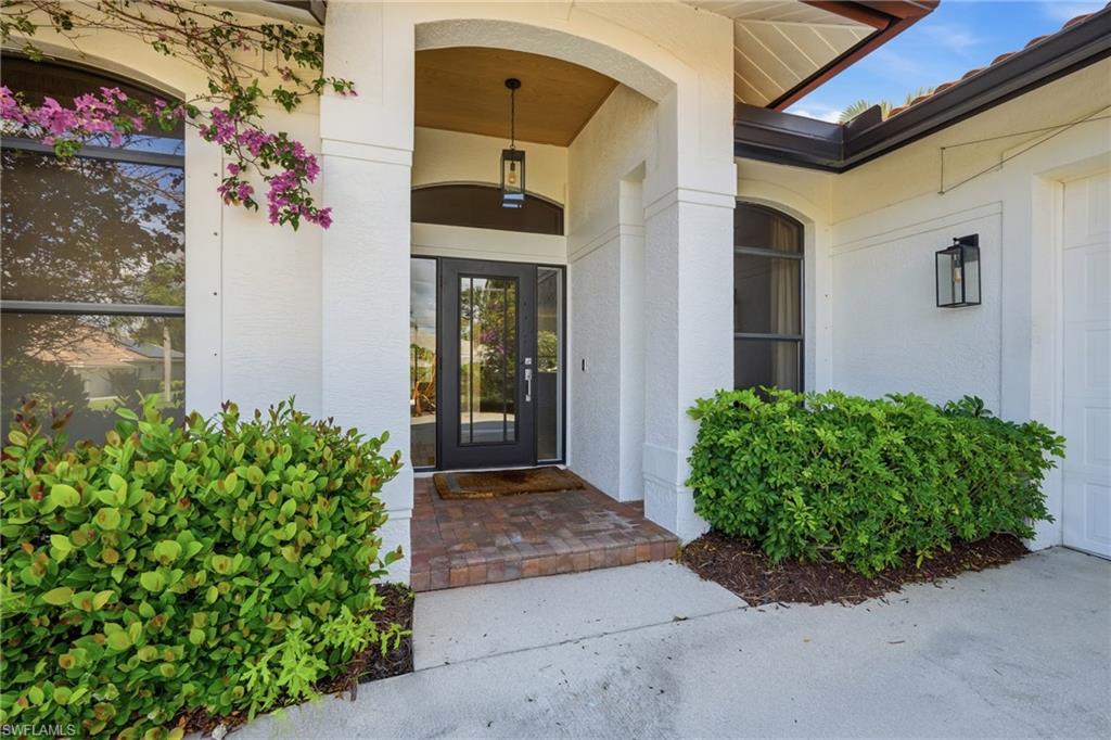 Elegant Home in the Prestigious Gated Community of Spanish Wells...Welcome to this beautiful and inviting residence located in the highly sought-after gated community of Spanish Wells in Bonita Springs. Known for its exceptional amenities and lifestyle, Spanish Wells offers residents access to a 27-hole championship golf course, fitness center, on-site dining, bocce courts, tennis, a heated community pool, and much more—providing a true resort-style living experience. This bright and spacious home features a well-designed open floor plan enhanced by cathedral ceilings that create an airy, welcoming atmosphere. The interior includes a built-in breakfast nook, a dedicated wine bar area, and an electric built-in fireplace, perfect for both everyday comfort and entertaining guests. Thoughtful architectural details and abundant natural light add to the home’s warmth and charm. Step outside to enjoy covered outdoor seating, ideal for alfresco dining and relaxing while taking in the serene surroundings. Whether hosting gatherings or enjoying quiet evenings at home, this space offers the perfect extension of indoor living. Located in the heart of Bonita Springs, this highly desirable community is just minutes from pristine beaches, shopping, dining, and entertainment, making it an ideal primary residence or seasonal retreat. Don’t miss this opportunity to own a home in one of Bonita Springs’ most desirable communities—where comfort, lifestyle, and location come together seamlessly.