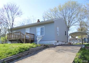 Completely updated ranch home with new kitchen cabinets, flooring, and countertops, new living room flooring, bathroom has been totally redone and updated, both bedrooms have new flooring, and home has been entirely repainted.  This home is definitely move in ready and ready for new buyers. You can entertain on the large front deck or on the new patio in the back.  Seller has updated the electric and will be placing a shed in the backyard for lawn storage.  Convenient location close to schools and shopping.