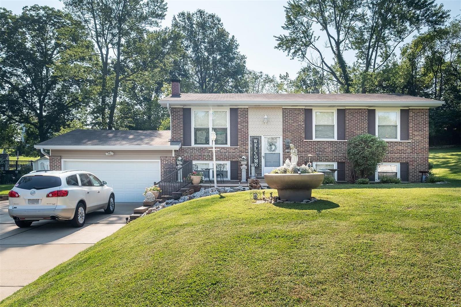 Not your ordinary large split foyer on over 1 acre. Close to everything! 3 bedrooms, 1 1/2 baths on the main level along with living/dining and kitchen with tons of storage and counter space. Deck off the kitchen leads to private back yard and pool area. Lower level has additional sleeping areas, full bath, family room and utility area. Oversized garage has plenty of room for cars and a workbench. All pool equipment stays as well. Extra parking for entertaining, camper, boat or whatever you have.  All appliances, TV's and some decor items convey.  Might be the only home of its kind on such a large lot in Arnold.  Open House scheduled for Sunday, March 27th from 12 - 2pm but don't wait until then.  It may already be gone.