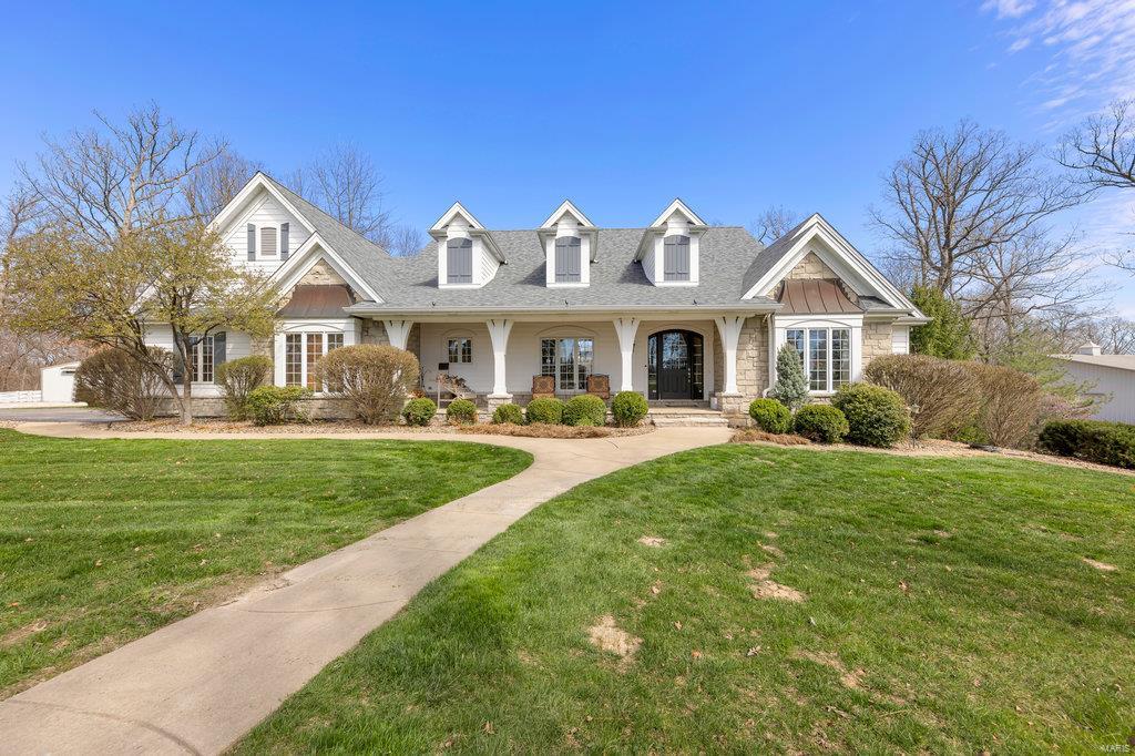 Welcome to this elegant custom home. This stunning property offers 4 bds, 4.5 Bths and 6000+/- square feet of living space. Upon entering, you are greeted by a meticulous interior that blends contemporary style with luxurious comfort. The home has high end finishes, w/an ambiance of sophistication and refinement. The expansive layout provides ample space for relaxing and hosting w/multiple living areas, 2 fireplaces, sunroom and amazing lower level entertaining space. The well appointed kitchen is a culinary masterpiece featuring top of the line appliances and an abundance of storage. For those with equestrian interests, this property is a dream come true with 10.3 sprawling acres offering stables, barns, riding arenas and more that are sure to please horse enthusiasts.  The outdoor space is impressive, offering a serene and picturesque environment. Additional Rooms: Sun Room
